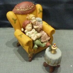 Porcelain Christmas Chair and table with Girl and Boy. (7.5 inches)